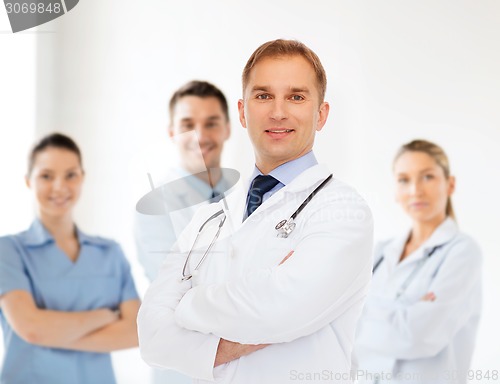 Image of smiling male doctor with stethoscope