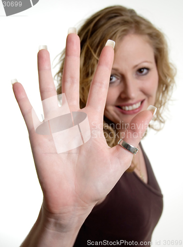 Image of Woman holding hand up