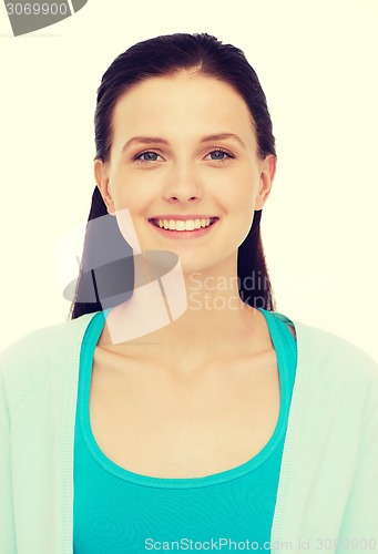 Image of smiling teenage girl in casual clothes