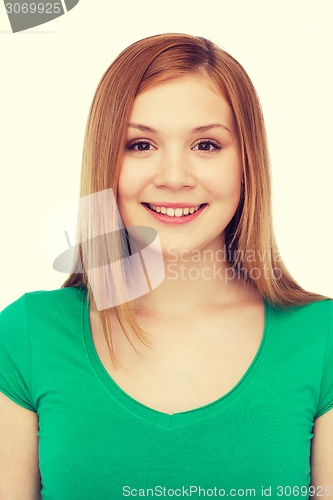 Image of smiling teenage girl in casual clothes