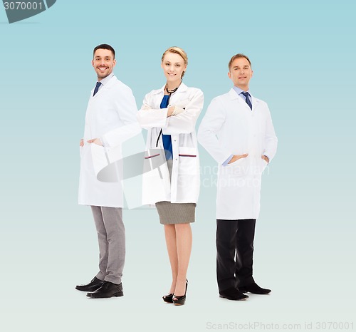 Image of group of smiling doctors in white coats