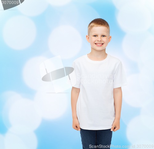 Image of smiling little boy in white blank t-shirt