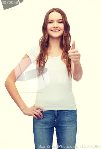 Image of smiling teenager in blank white t-shirt