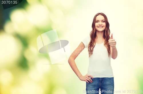 Image of smiling teenager in blank white t-shirt