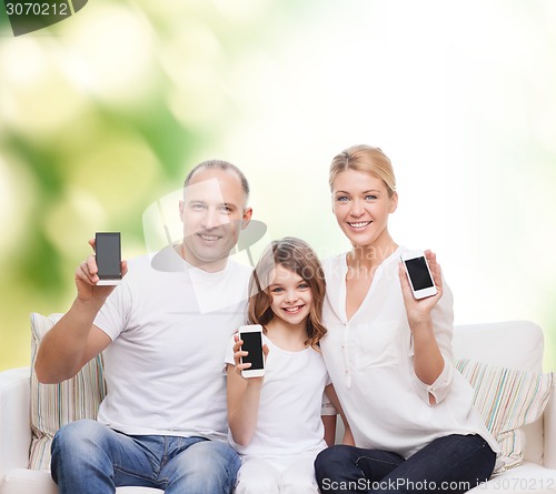 Image of happy family with smartphones