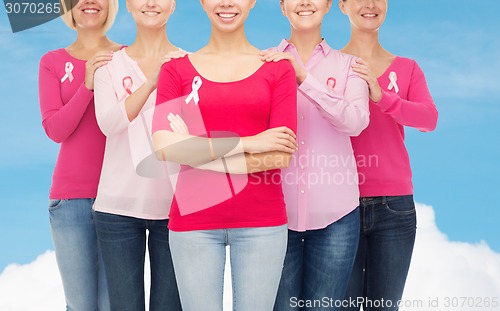 Image of close up of women with cancer awareness ribbons