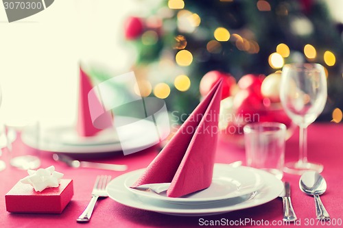 Image of room with christmas tree and decorated table