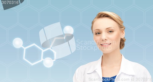 Image of smiling female doctor with molecule of serotonin