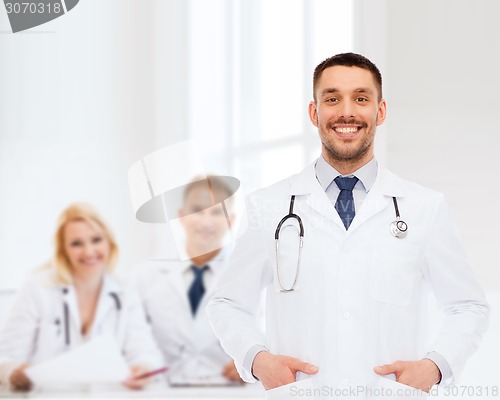 Image of smiling male doctor with stethoscope