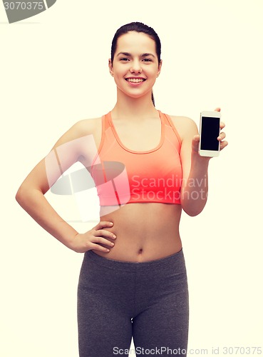 Image of sporty woman with smartphone
