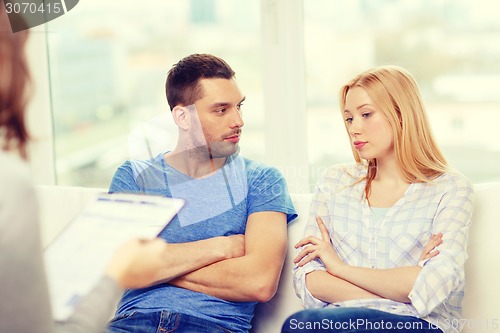 Image of young couple with a problem at psychologist office