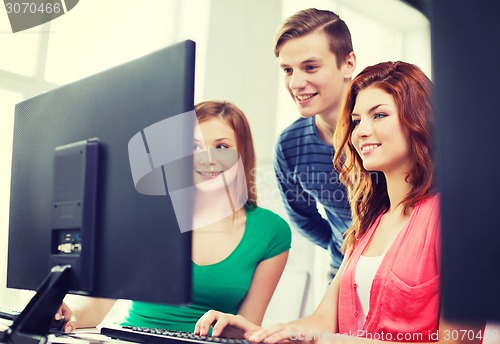 Image of group of smiling students having discussion