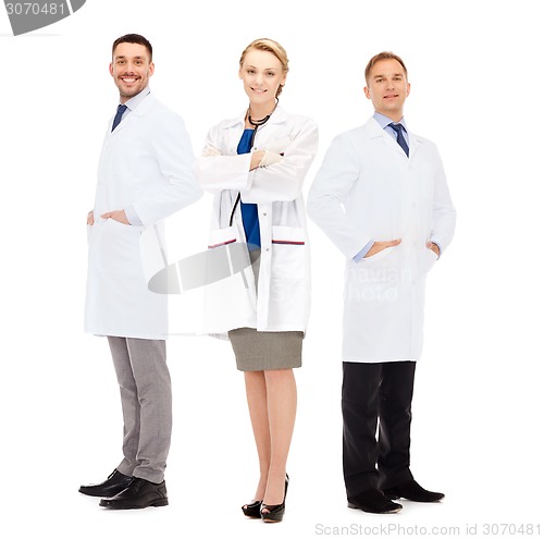 Image of group of smiling doctors in white coats
