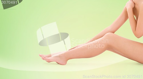 Image of naked woman legs