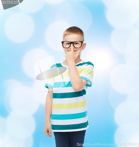 Image of smiling little boy in eyeglasses