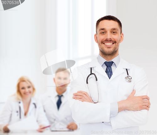 Image of smiling male doctor with stethoscope