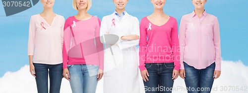 Image of close up of women with cancer awareness ribbons