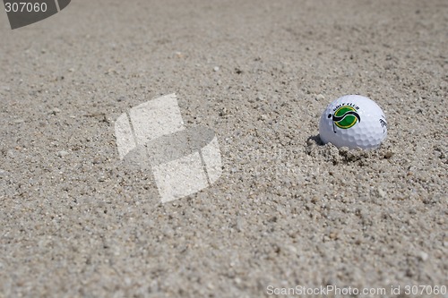 Image of Golf ball in sand trap