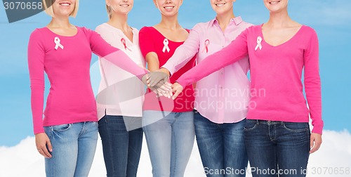 Image of close up of women with cancer awareness ribbons