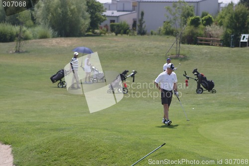 Image of Golfers in golf course