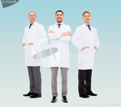 Image of smiling male doctors in white coats