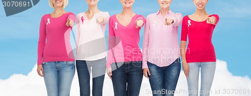 Image of close up of women with cancer awareness ribbons