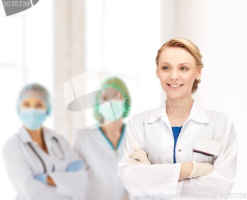 Image of smiling young female doctor in hospital