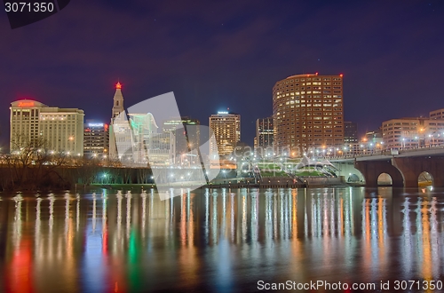 Image of downtown Hartford Connecticut at dusk from across the Connecticu