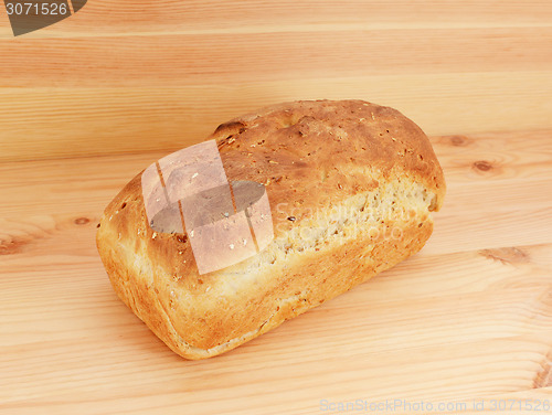 Image of Freshly baked loaf of oat and linseed bread