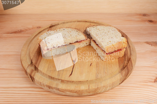 Image of Freshly-made peanut butter and jam sandwiches