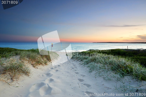 Image of Sandy beach trail at dusk sundown Australia