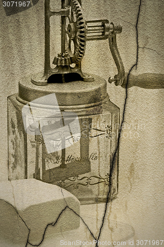 Image of butter churn with a piece of butter