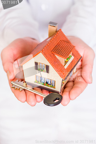 Image of House in human hands