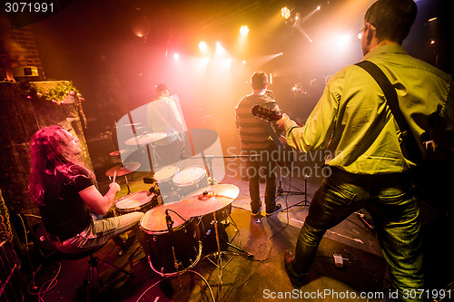 Image of Band performs on stage