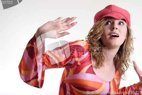 Image of Startled woman in 70s attire