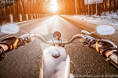 Image of Biker First-person view. Winter slippery road