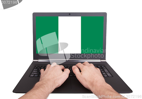 Image of Hands working on laptop, Nigeria