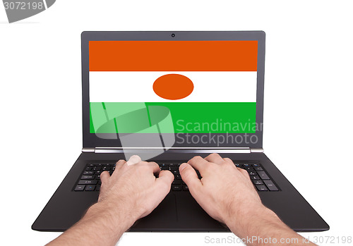 Image of Hands working on laptop, Niger