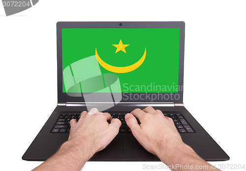 Image of Hands working on laptop, Mauritania