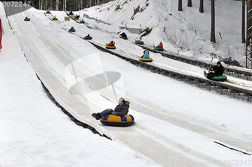 Image of Children ride the route for a snoutyubing.