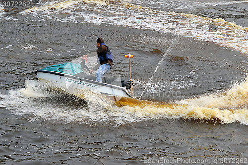 Image of the man on a hydrocycle.