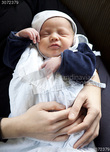 Image of infant on arm