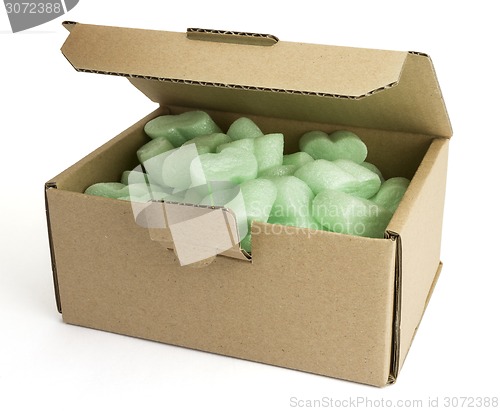 Image of packaging box with green foam