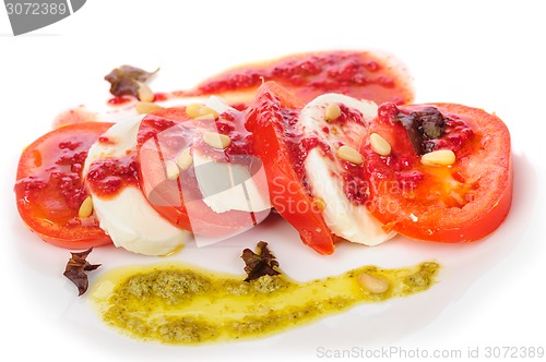 Image of Caprese antipasto salad with mozarella cheese, tomatoes 