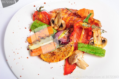 Image of grilled chicken fillet and vegetables