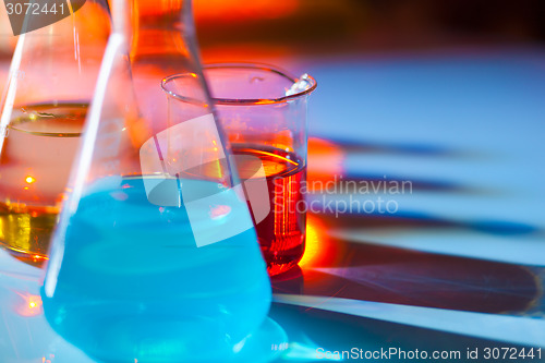 Image of Backlit laboratory flask.