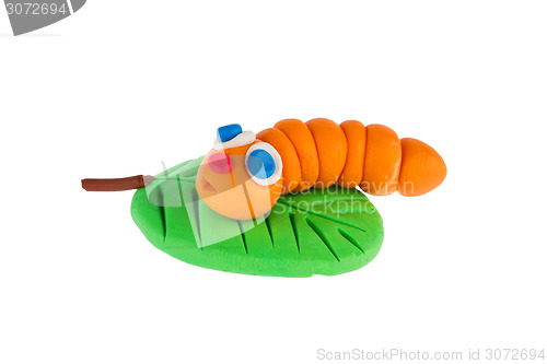 Image of Worm from plasticine on white background