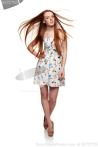 Image of Full length woman in summer dress