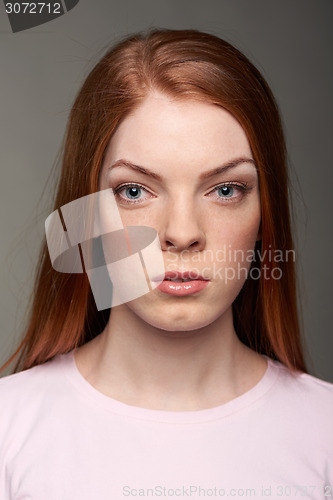 Image of red hair woman