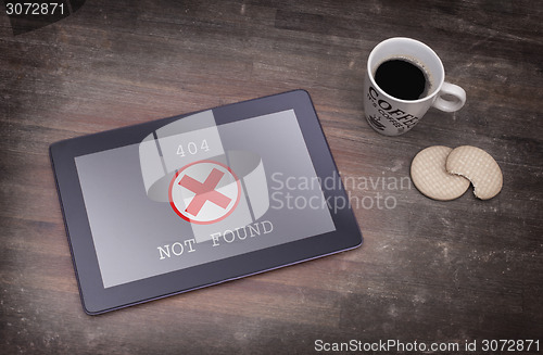Image of Tablet displaying an error, 404
